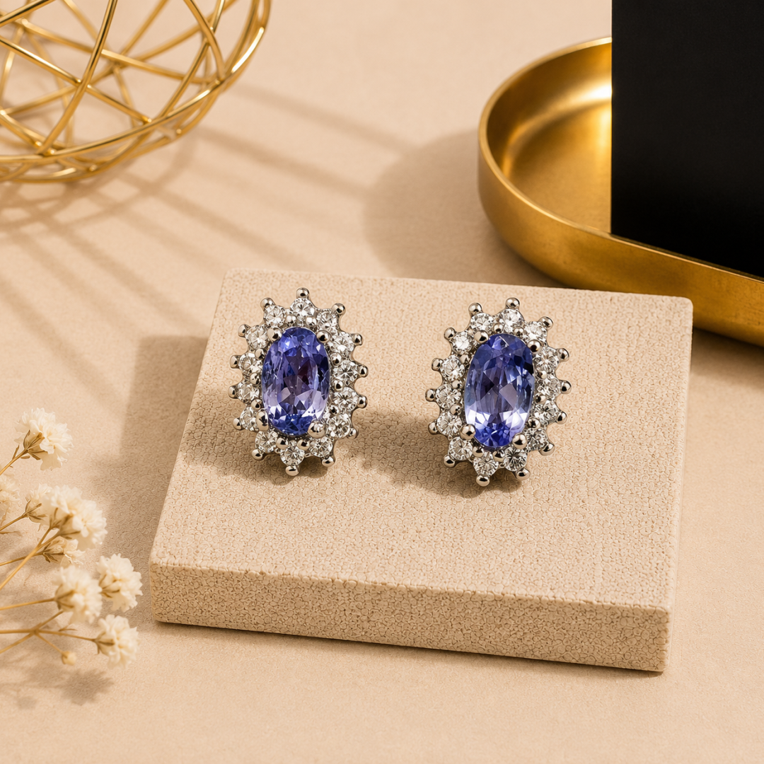 Anzanite oval earring stud 5x3mm set in 925 silver with CZ highlights